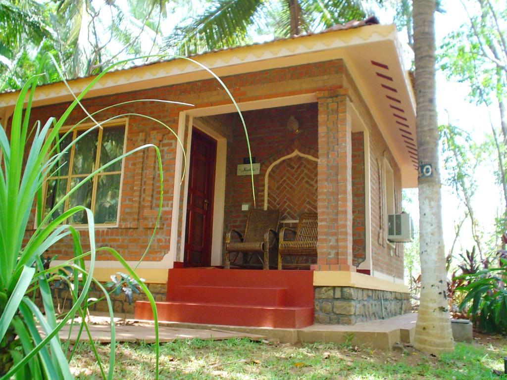 Kairali - The Ayurvedic Healing Village Palakkad Szoba fotó
